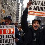 Image: People shout slogans agains police as they take part in a march against police violence, in New York